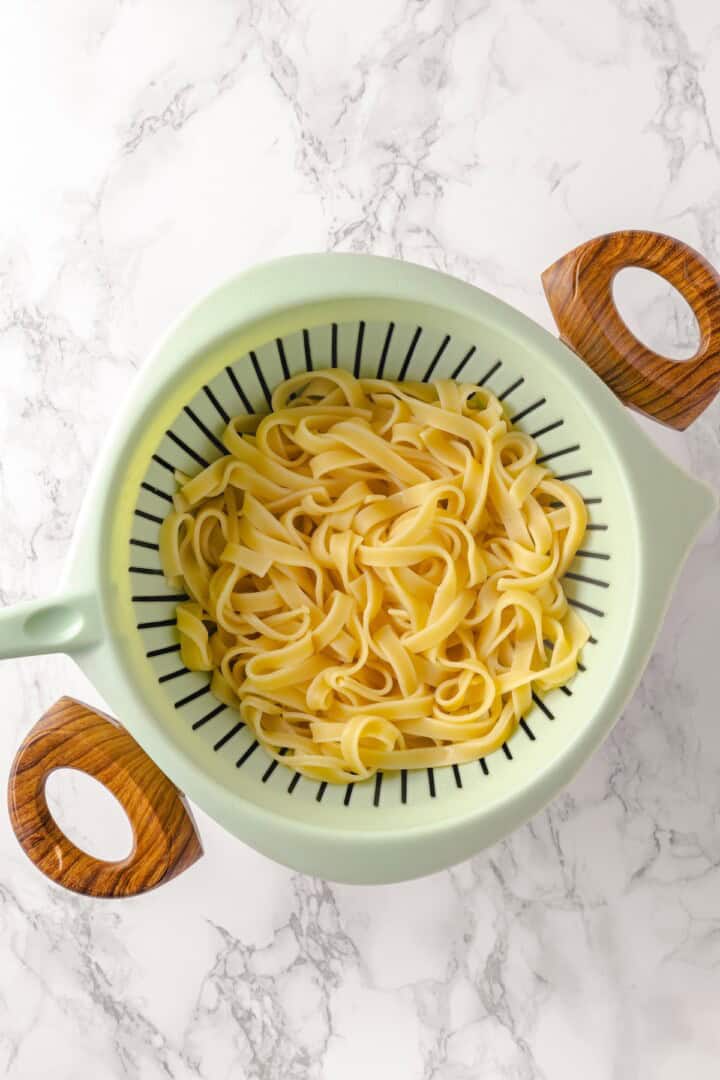 Cooked pasta in colander