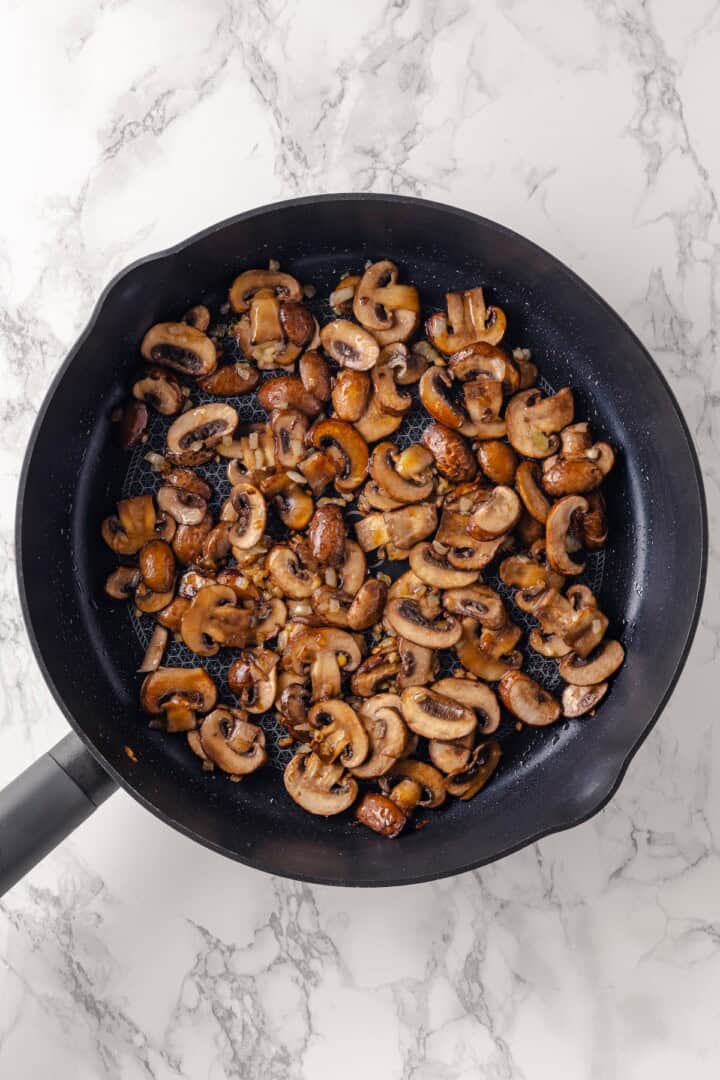 Sauteed mushrooms in skillet