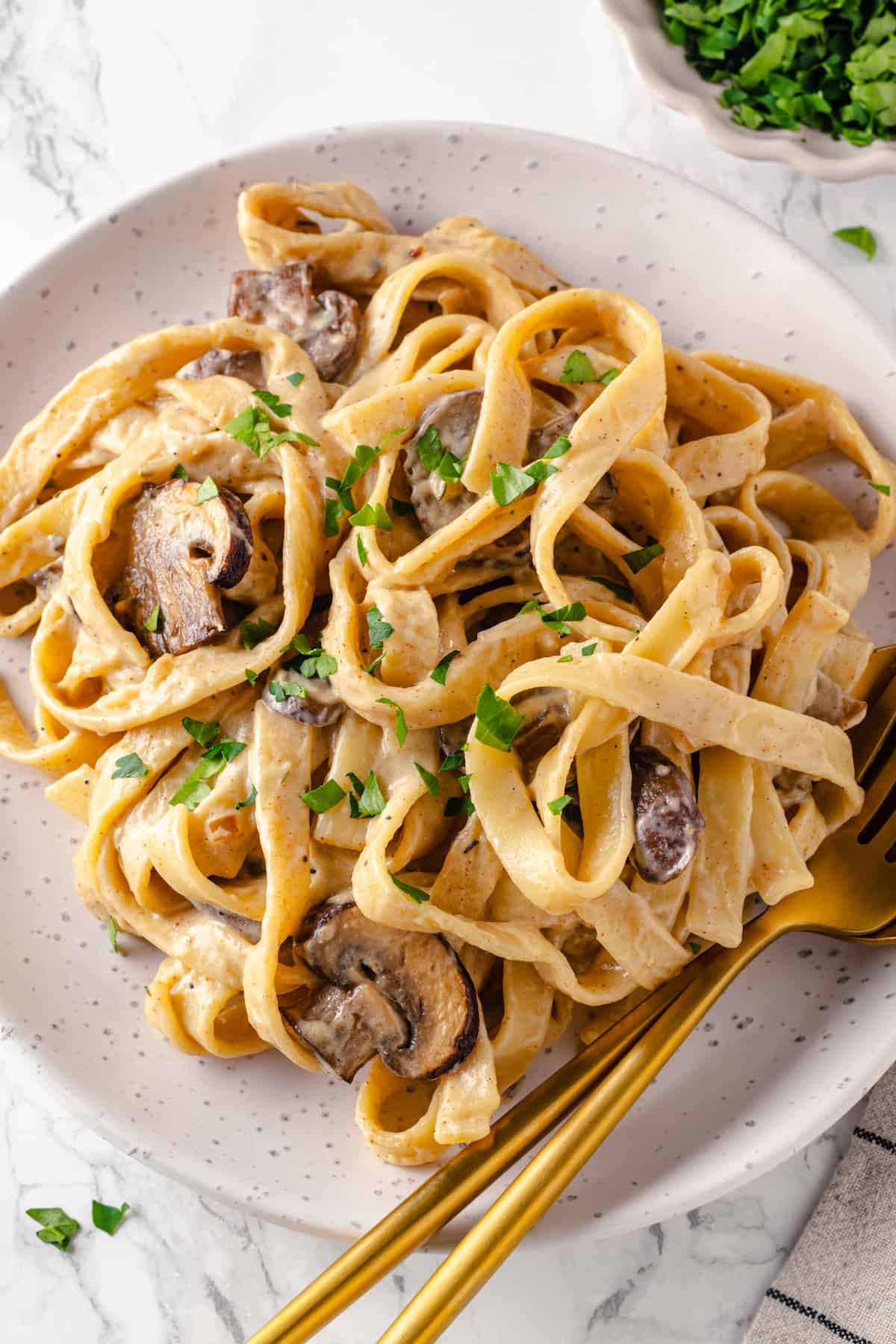 Top-down view of mushroom stroganoff on plate