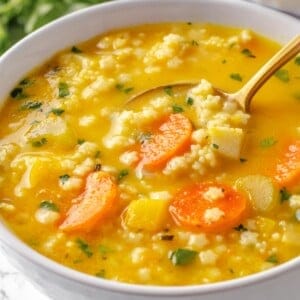 Bowl of Italian penicillin soup with spoon