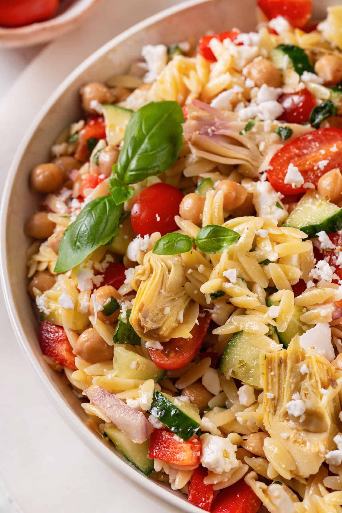 Closeup of vegan orzo pasta salad