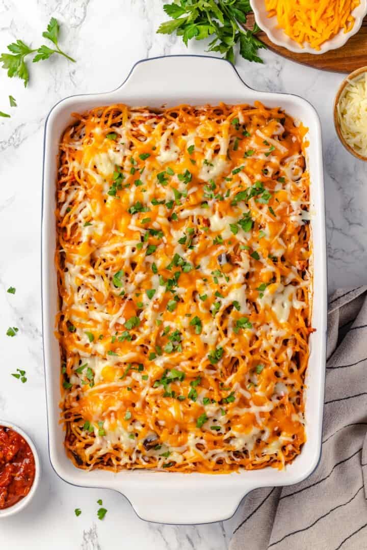 Overhead view of vegan baked spaghetti in casserole dish