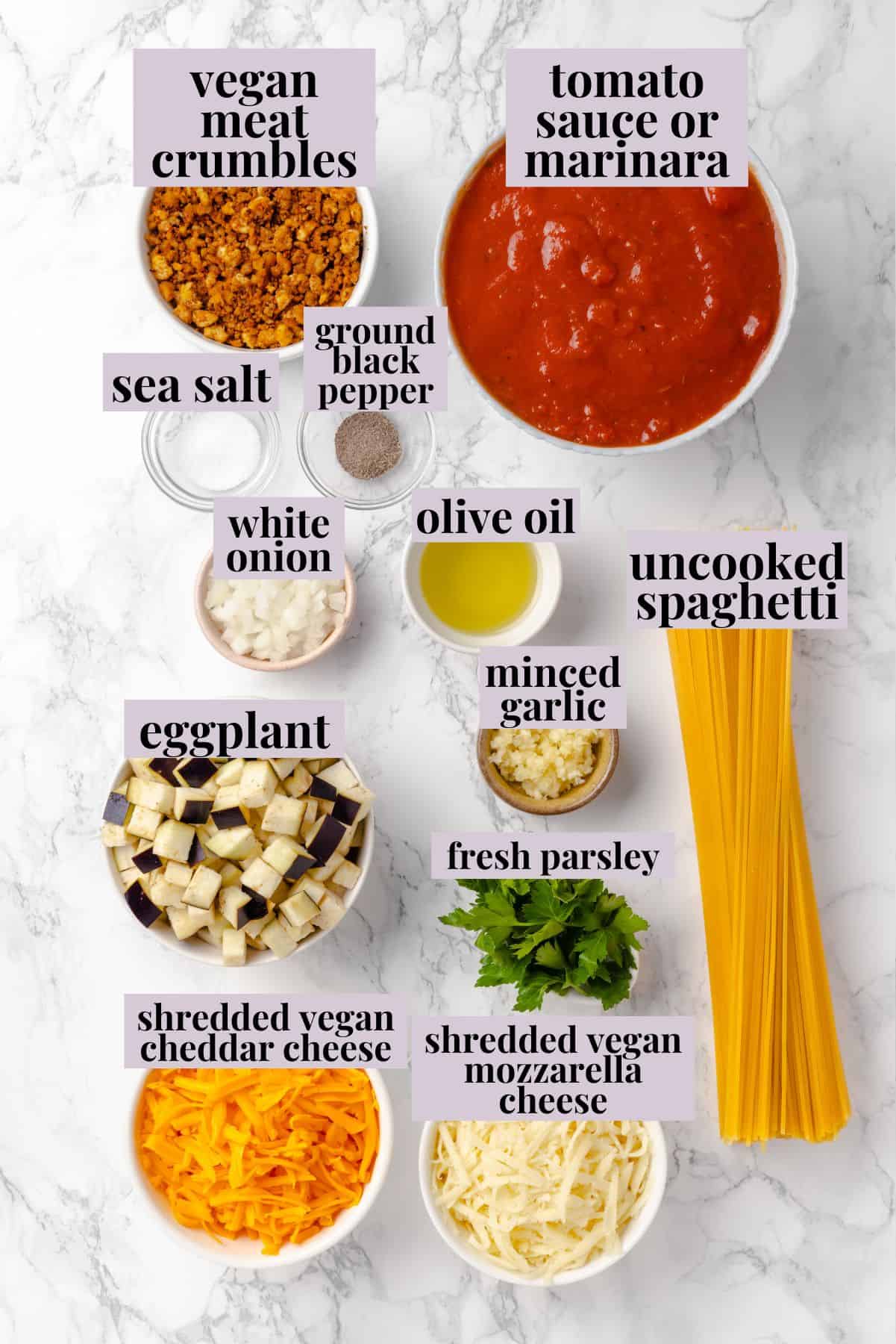 Overhead view of baked spaghetti ingredients with labels