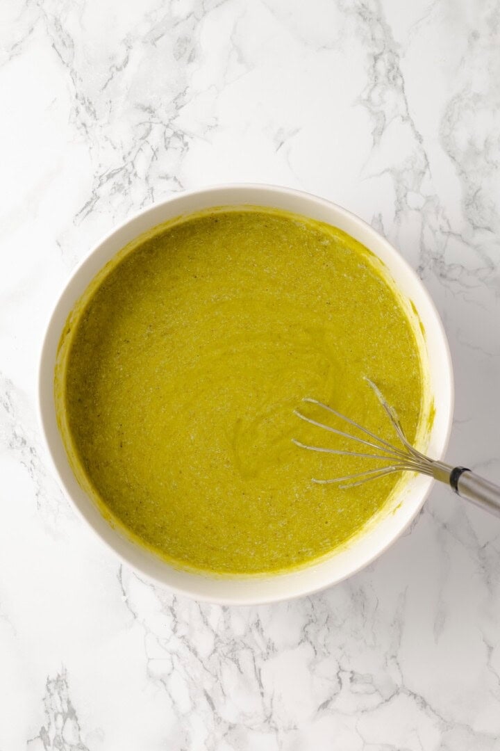 Overhead view of liquid ingredients for pistachio cake