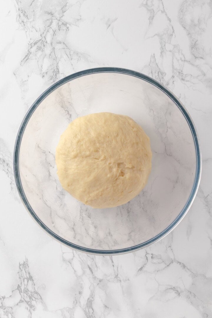 Overhead view of dough for air fryer donuts before rising