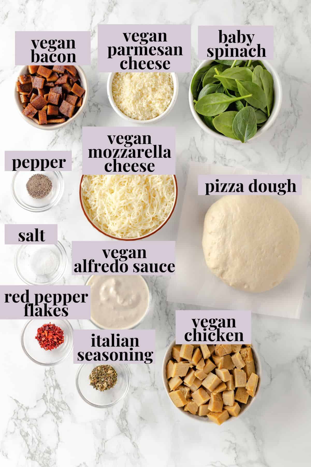 Overhead view of ingredients for Alfredo sauce pizza