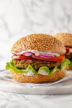Vegan falafel burger on sesame seed bun