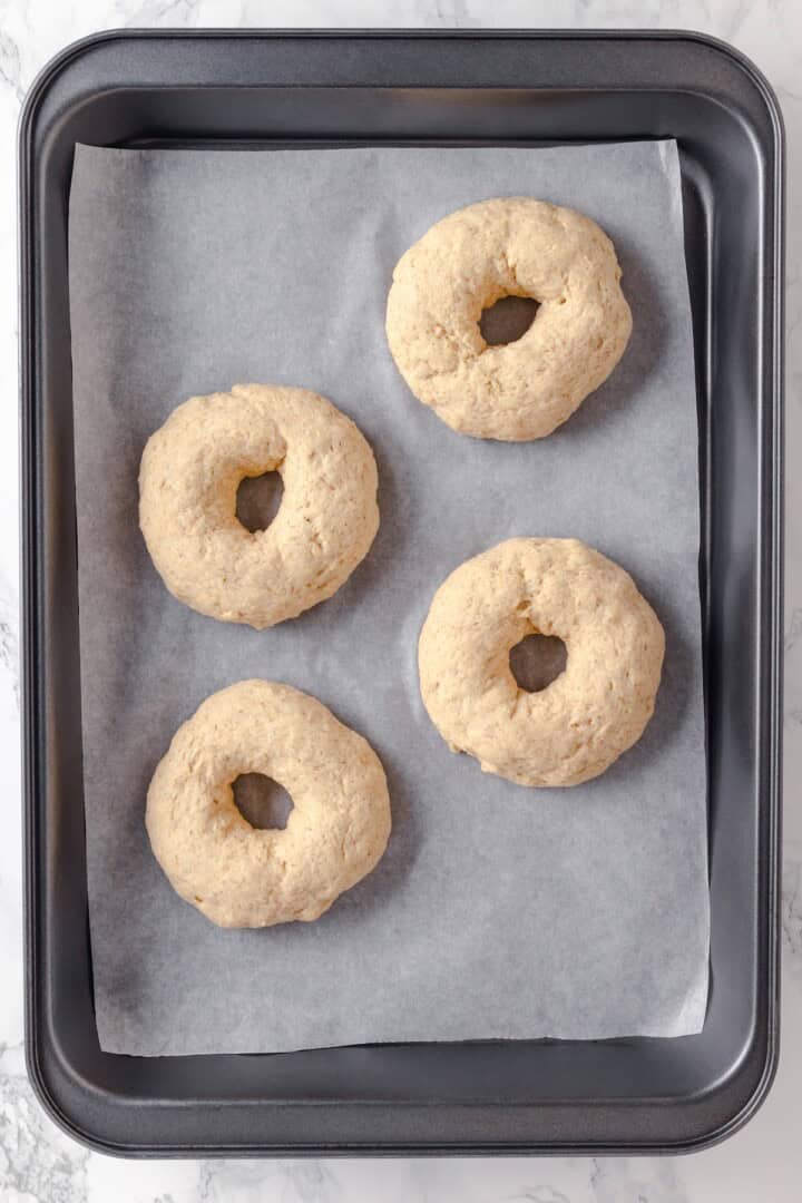 Overhead view of gluten-free bagels before boiling
