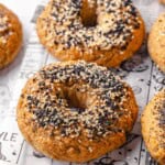 Homemade gluten-free bagels on wire cooling rack