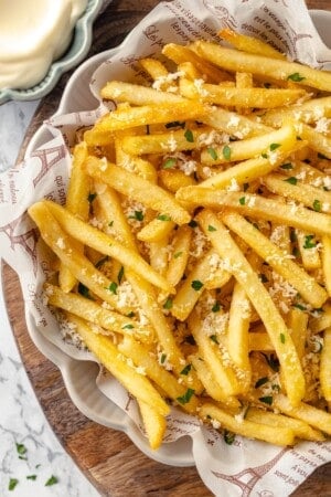 Overhead view of crispy vegan truffle fries in bowl