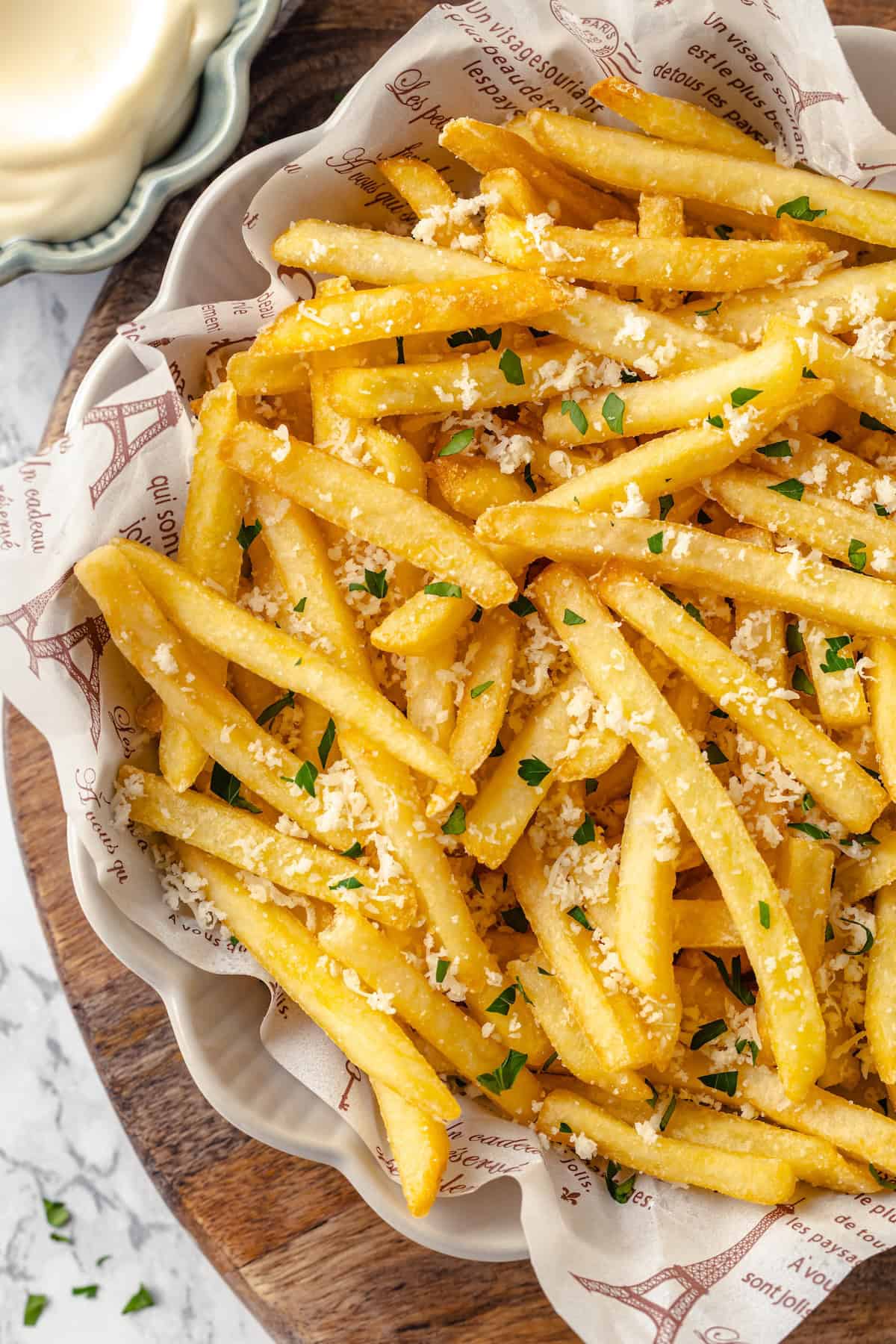 Overhead view of crispy vegan truffle fries in bowl