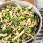 Vegan broccoli slaw in bowl with spoon