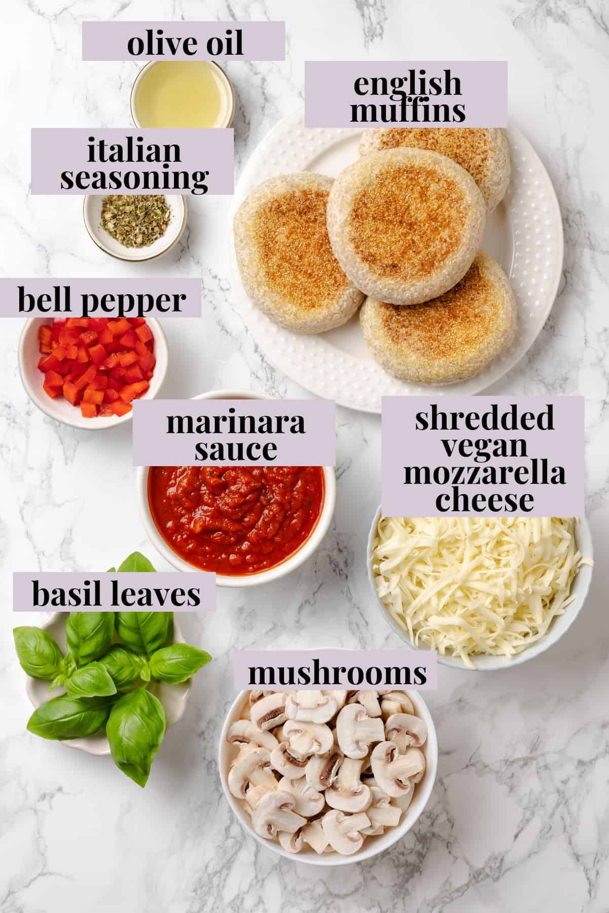 Overhead view of ingredients for English muffin pizzas
