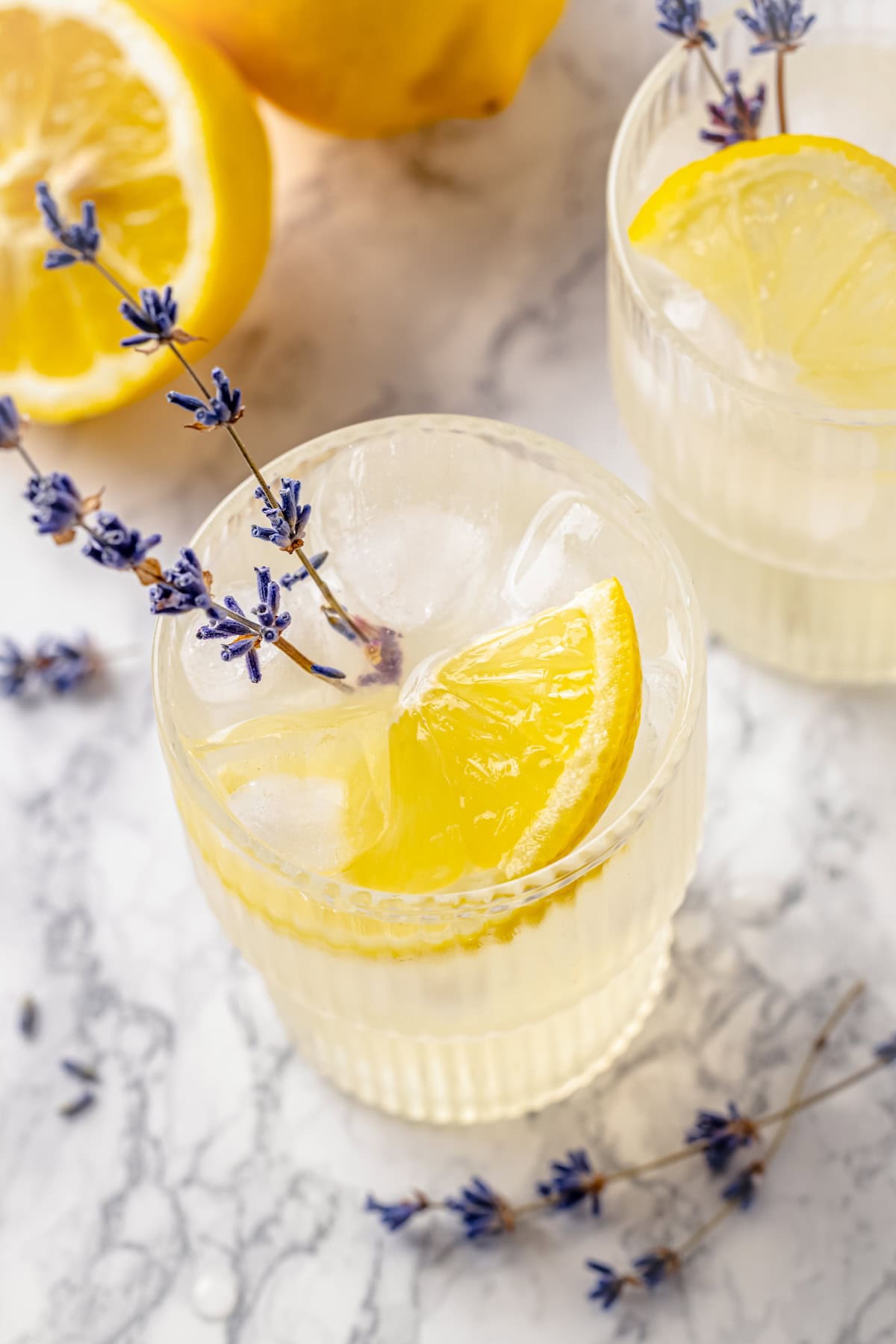 Top-down view of lavender lemonade in glasses