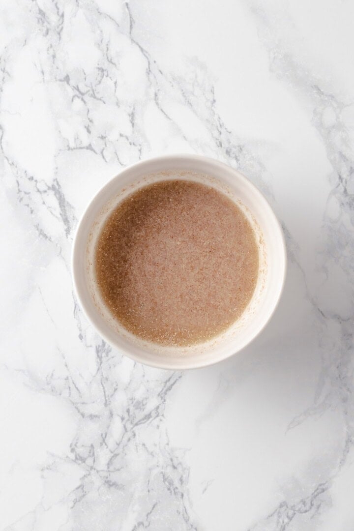 Overhead view of flax egg mixture in bowl