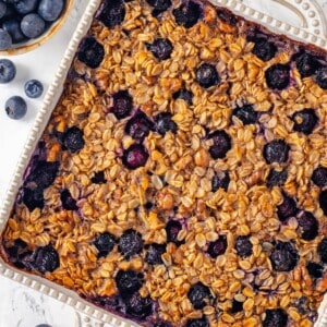 Overhead view of blueberry baked oatmeal in baking dish