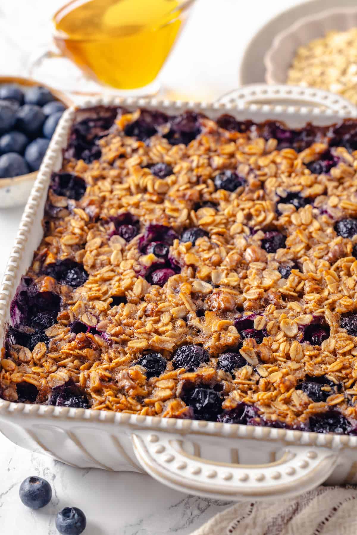 Baked oatmeal with blueberries in baking dish