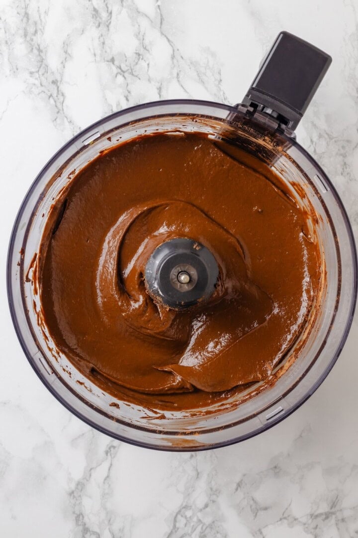 Overhead view of vegan chocolate mousse in food processor