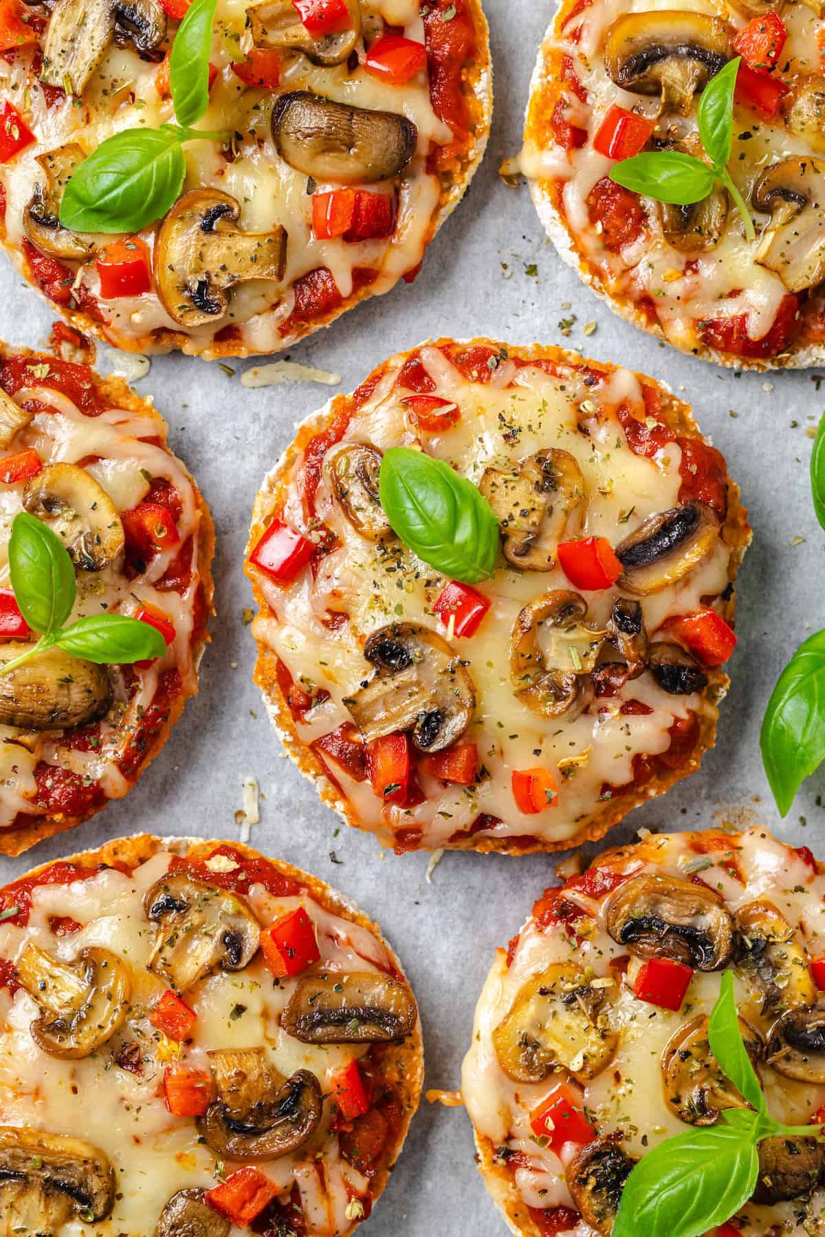 Overhead view of vegan English muffin pizzas