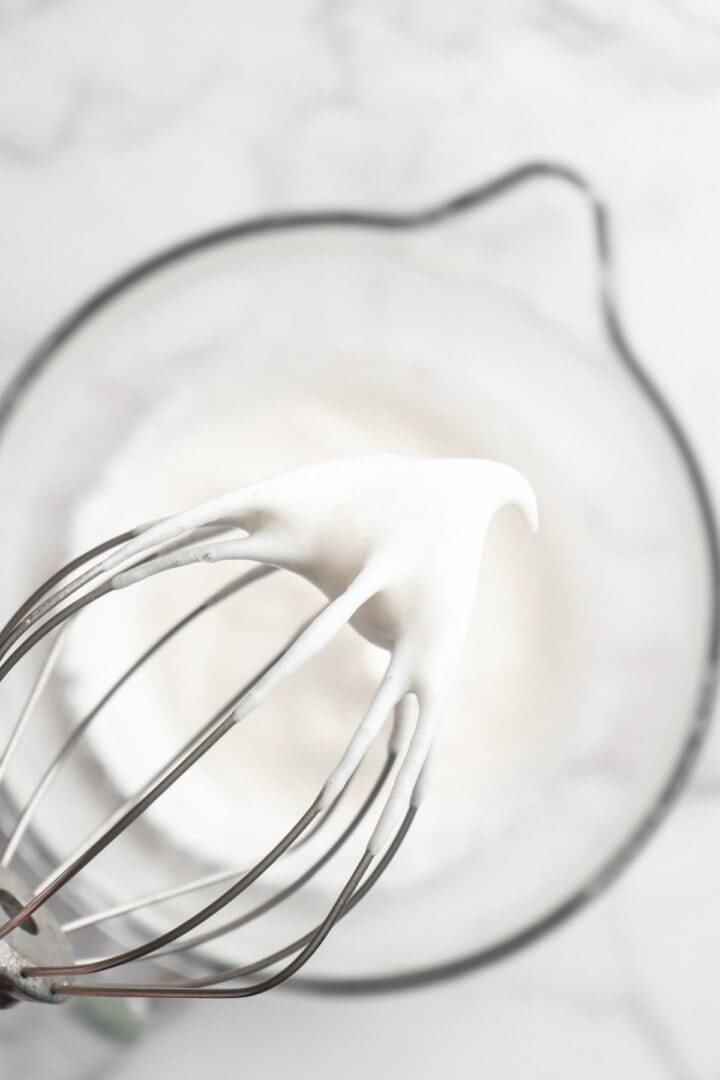 Stiff peak of aquafaba on whisk