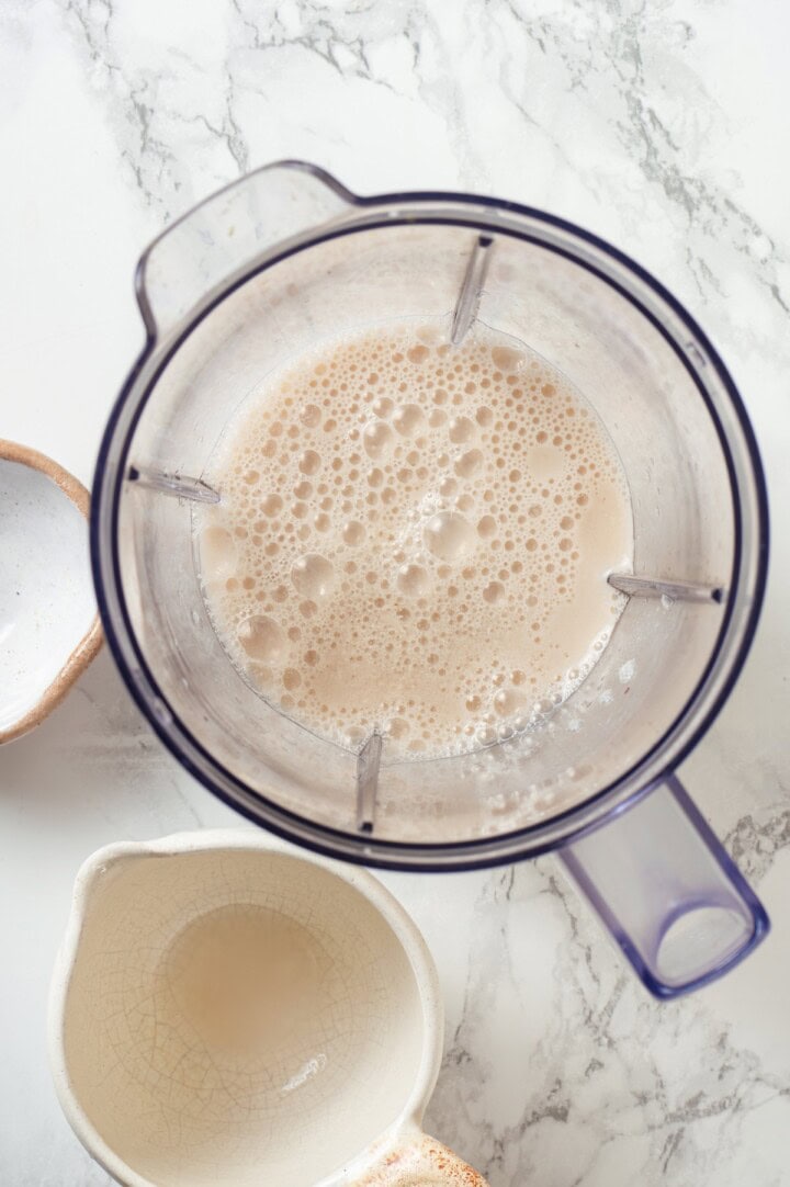 Overhead view of vegan buttermilk mixture in blender