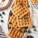 Overhead view of protein waffles on platter