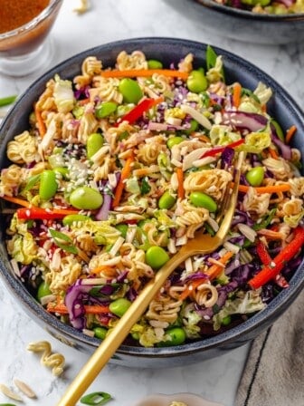 Overhead view of ramen noodle salad in bowl with fork