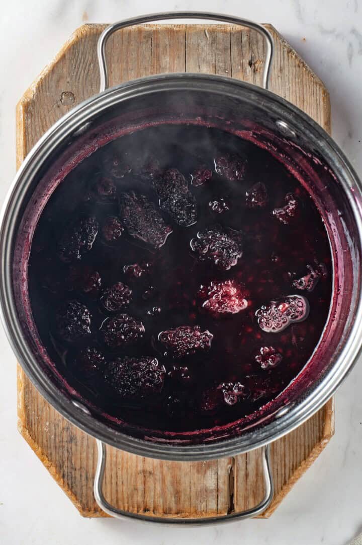Overhead view of blackberry syrup in pan