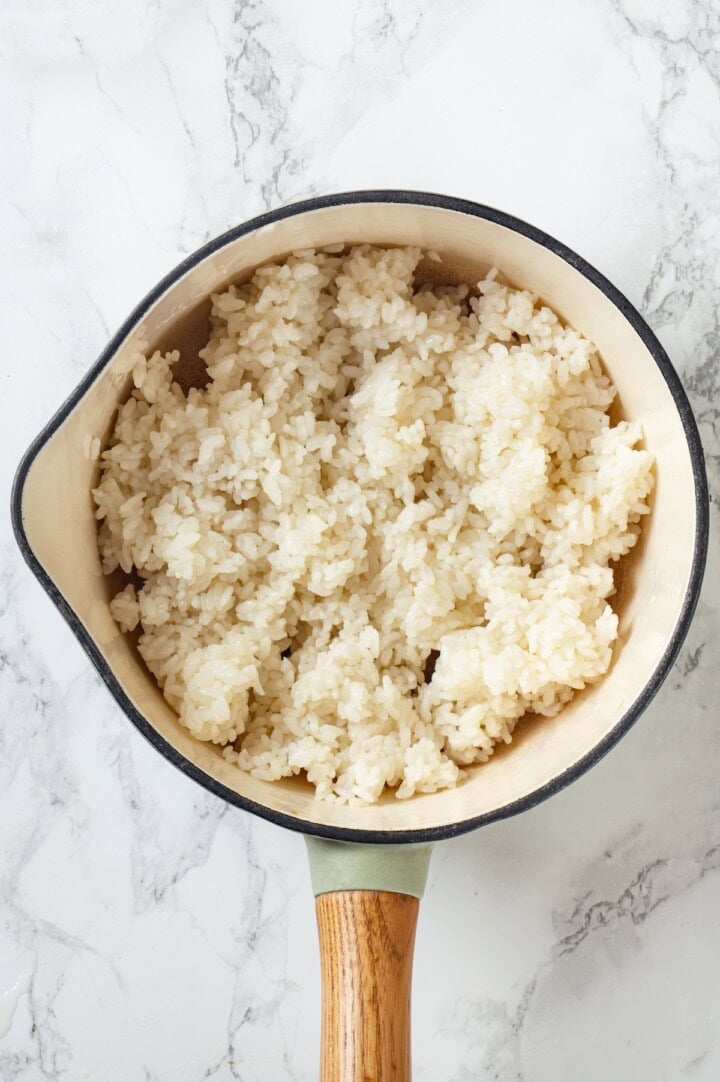 Overhead view of sushi rice in pan