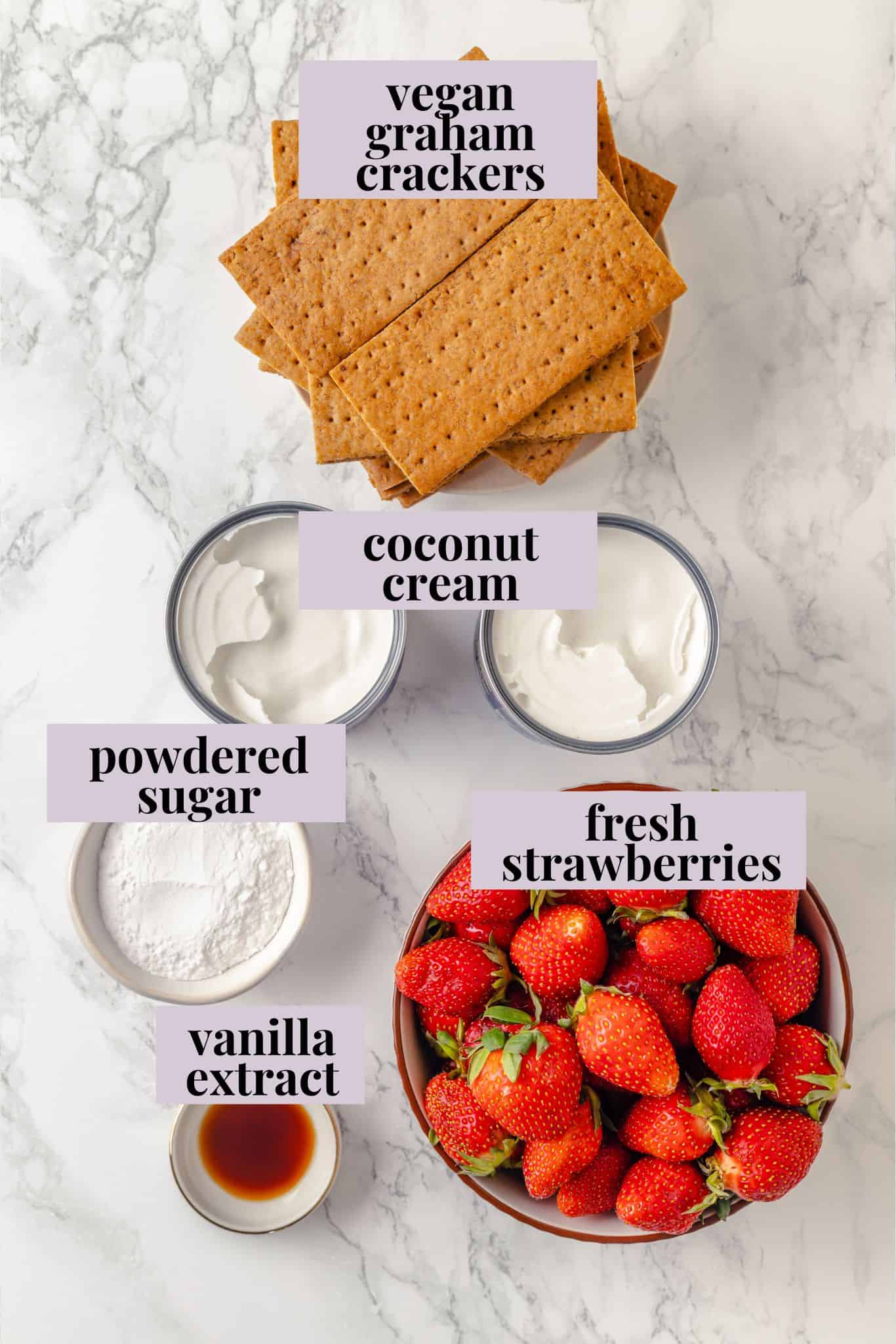 Overhead view of ingredients for strawberry icebox cake
