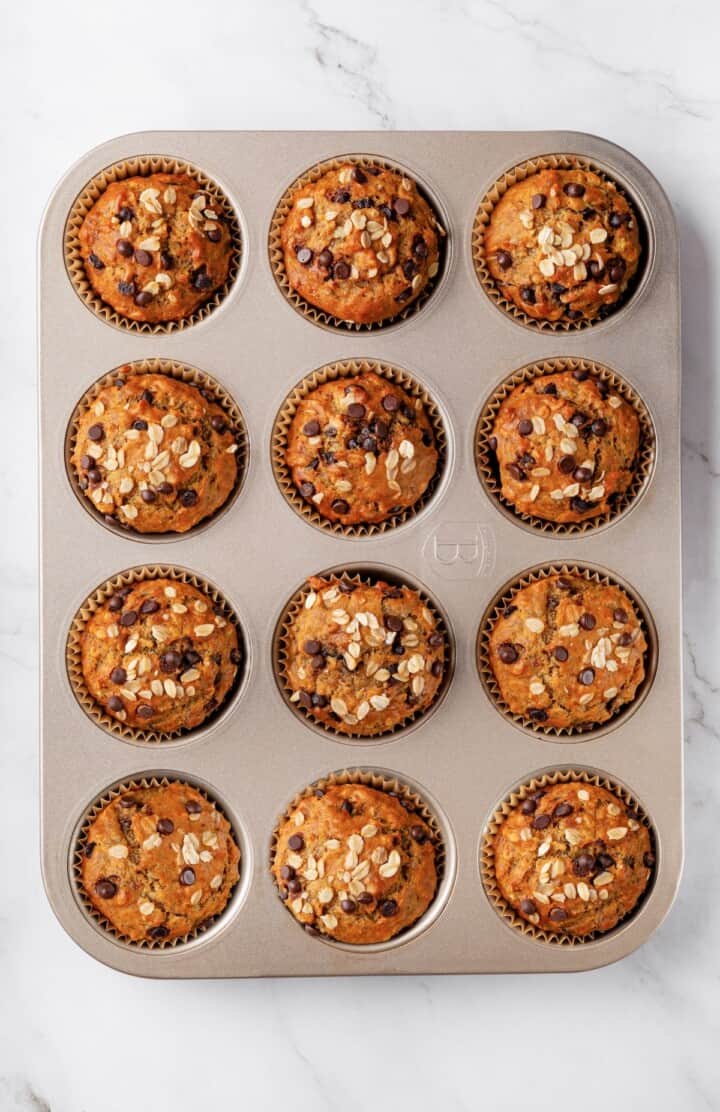 Overhead view of banana oatmeal muffins in muffin pan