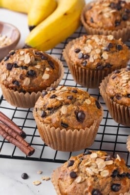Banana oatmeal muffins cooling on wire rack