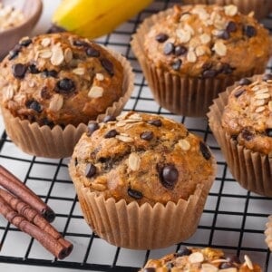 Banana oatmeal muffins cooling on wire rack