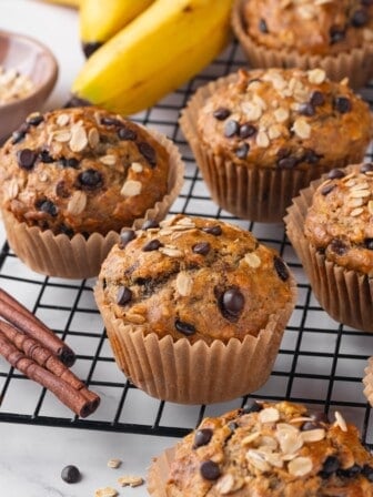 Banana oatmeal muffins cooling on wire rack