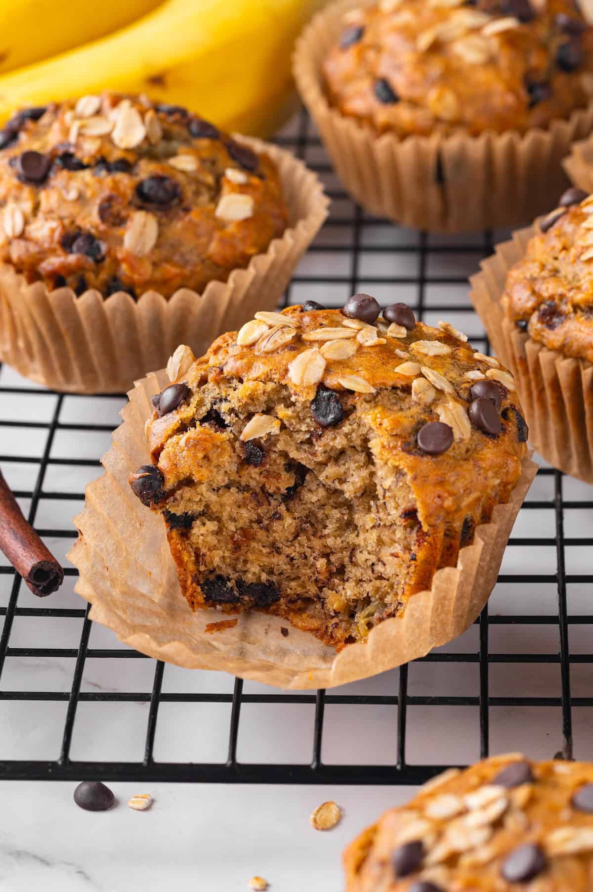Banana oatmeal muffin with bite taken out