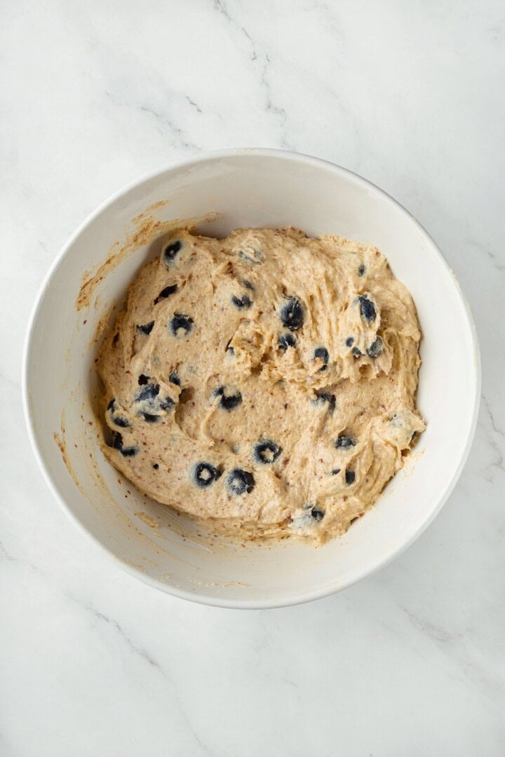 Overhead view of blueberry buckle batter in bowl