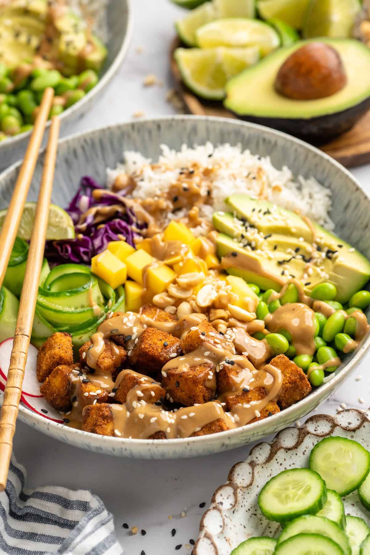 Peanut tofu bowl with chopsticks