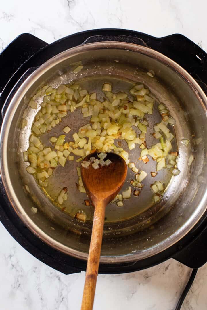 Overhead view of onion cooking in Instant Pot