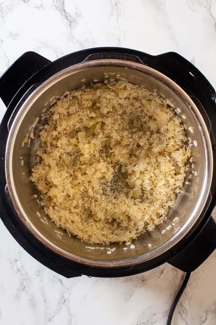 Overhead view of toasted rice in Instant Pot
