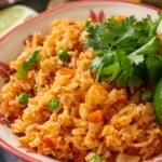 Instant Pot Mexican rice in bowl with cilantro for garnish