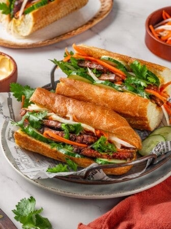 Two tofu banh mi sandwiches on plate