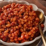 Bowl of baked beans with spoon