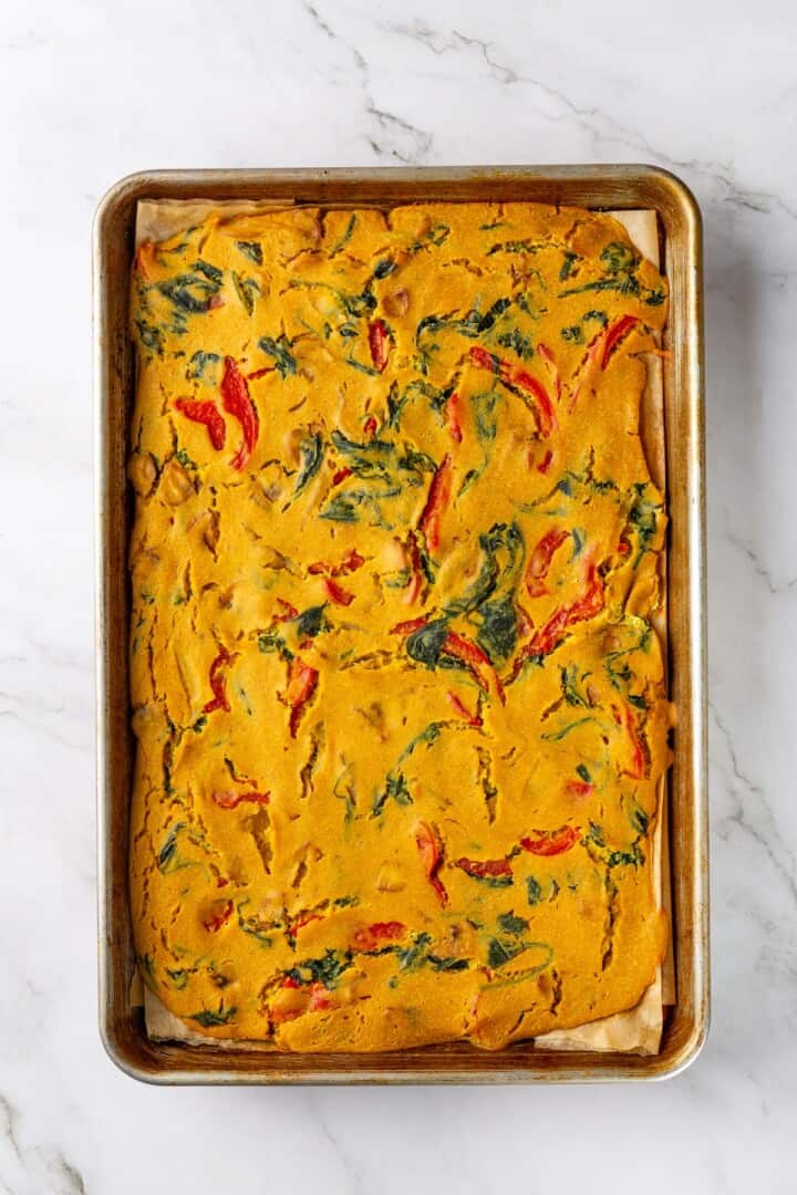 Overhead view of vegan omelet in sheet pan