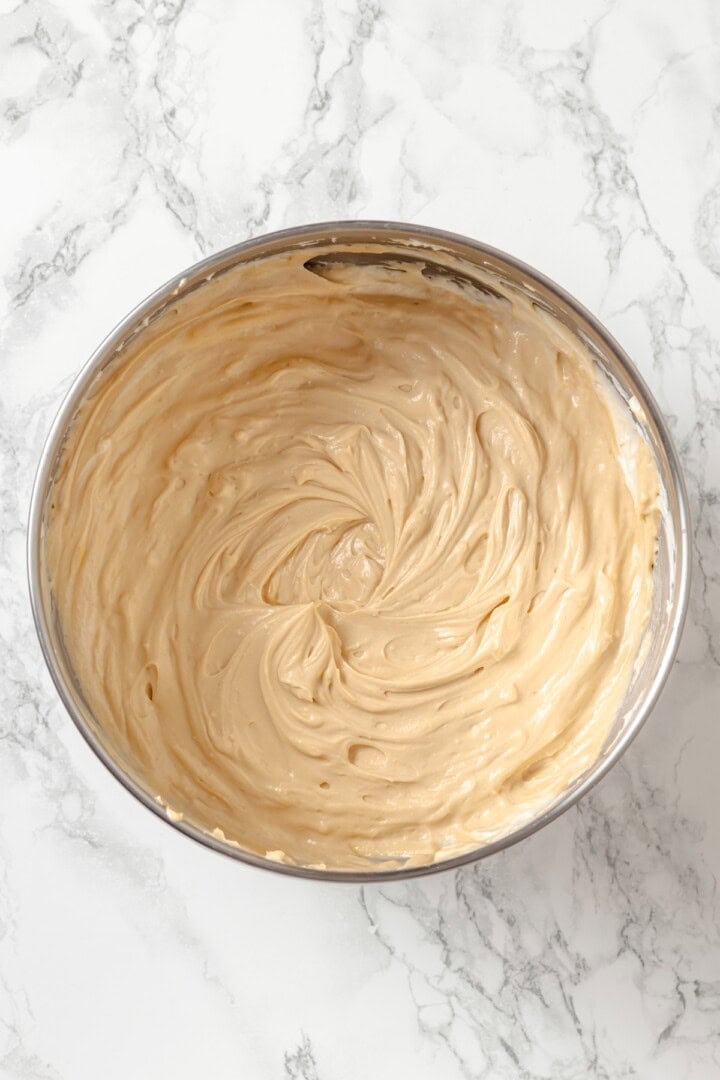 Biscoff cheesecake mixture in bowl.