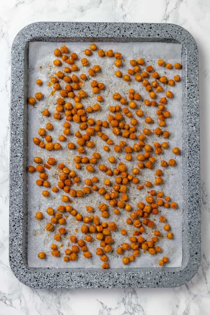 Crispy roasted chickpeas on sheet pan.