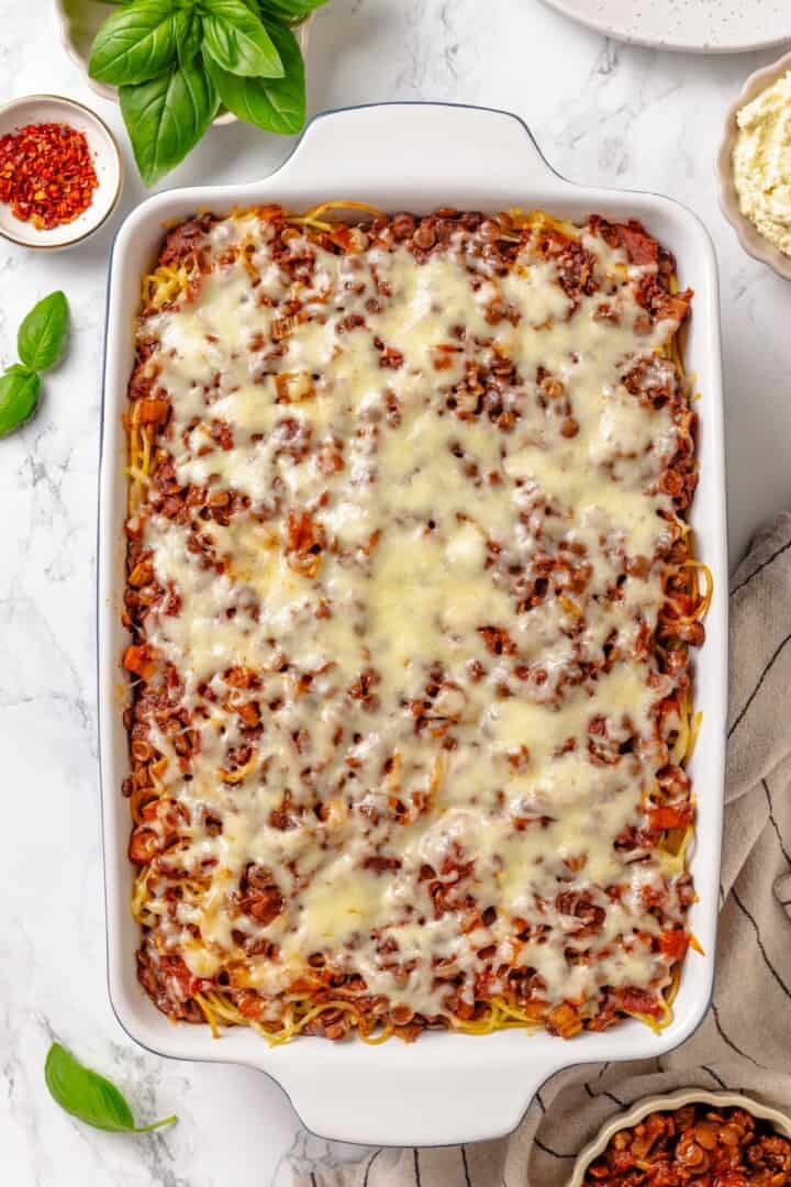 Overhead view of million dollar spaghetti in baking dish.