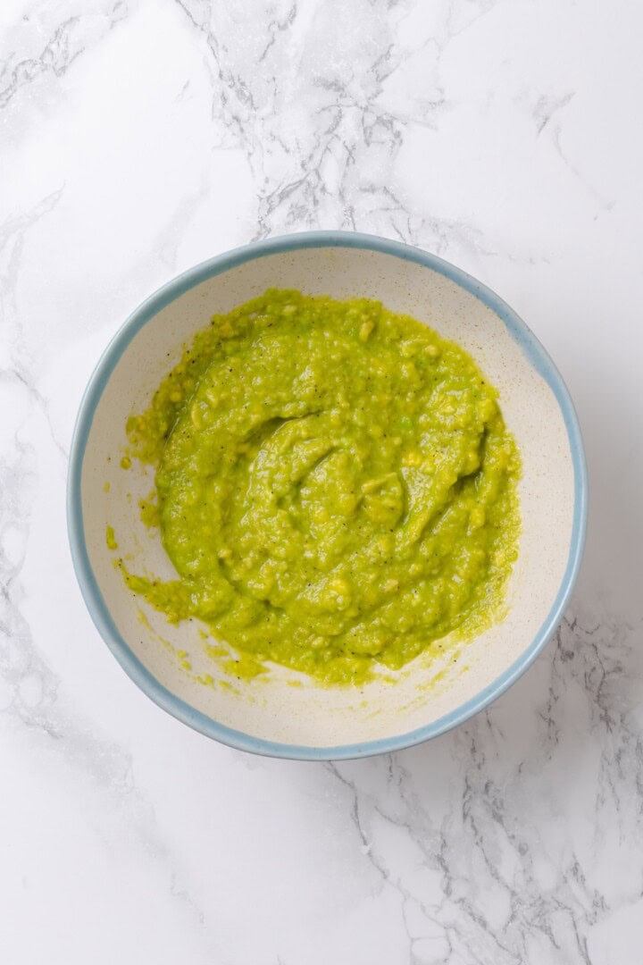Overhead view of avocado slime in bowl