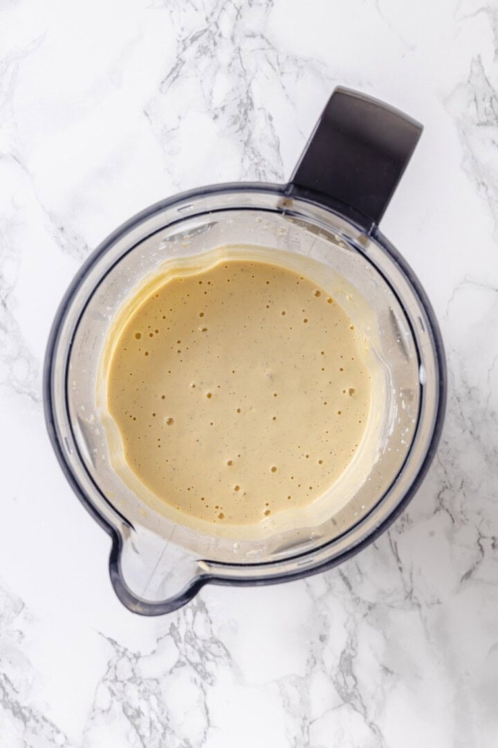 Overhead view of tofu egg mixture in blender