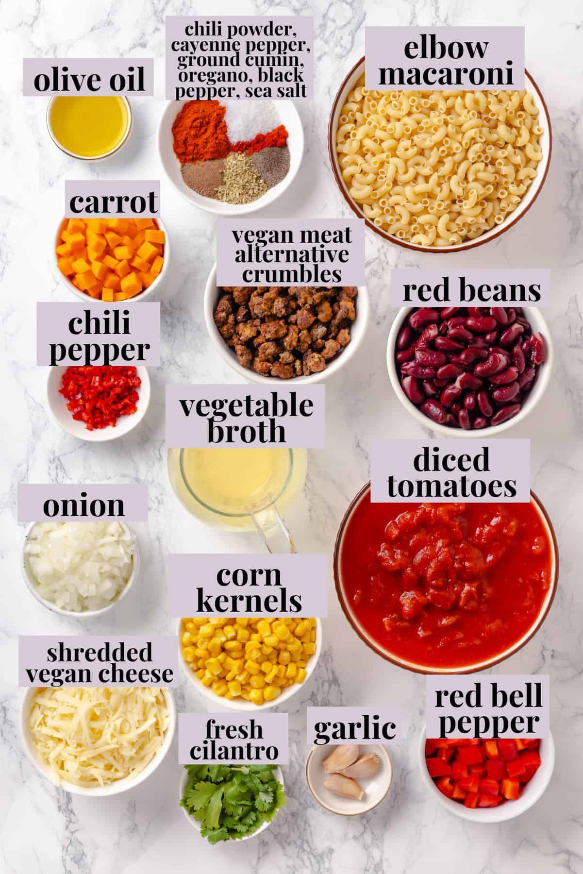 Overhead view of ingredients for chili mac and cheese with labels.