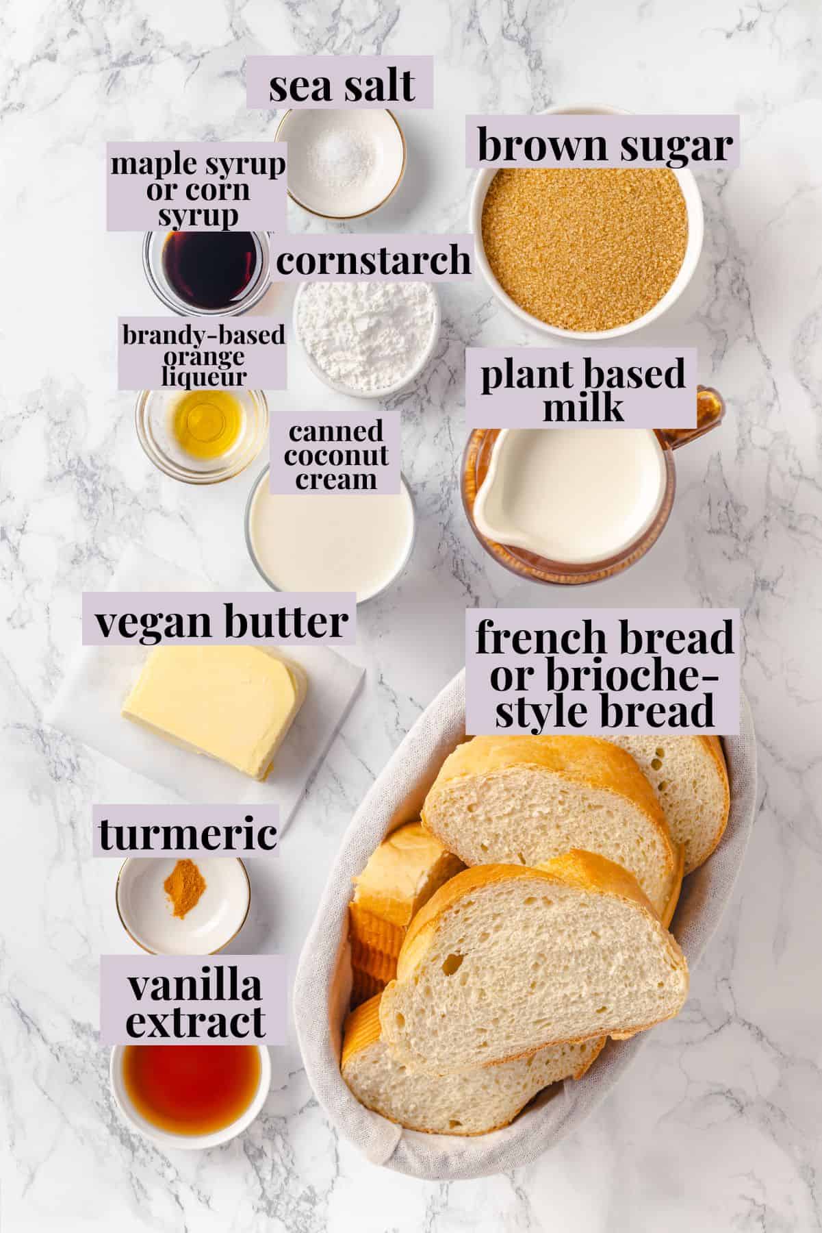 With a rich vegan custard and caramel, this Creme Brûlée French Toast has the flavour of the classic dessert in crowd-pleasing breakfast form! Overhead view of ingredients for creme brulee French toast with labels.